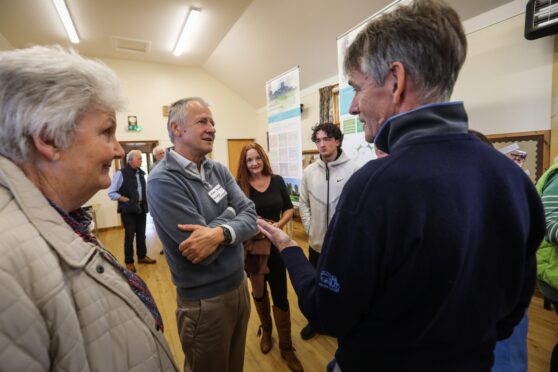 Planning consultant Robin Holder (left) hears the views of locals at the drop-in event. Image: Mhairi Edwards/DC Thomson
