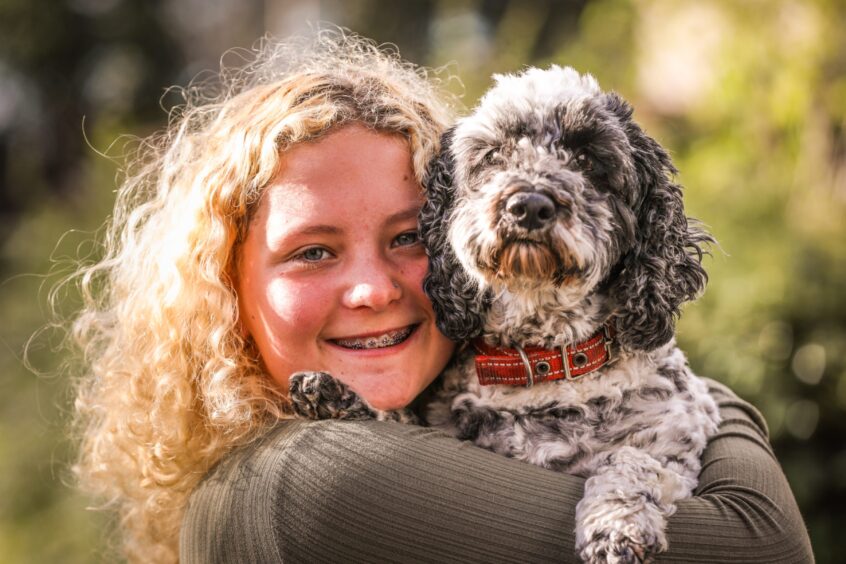 Ruby McDonald with Betty Boo the Cockapoo
