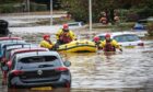 Coastguard personnel mount a rescue mission in Invergowrie. Image: DC Thomson/ Mhairi Edwards.
