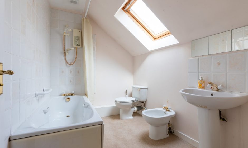 The large upstairs bathroom at Cross Keys House in Perth.