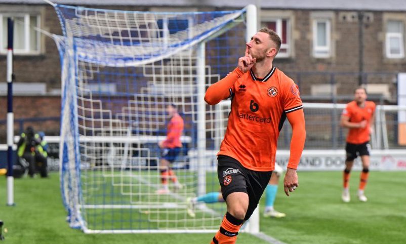 Louis Moult celebrates his leveller for Dundee United against Raith Rovers