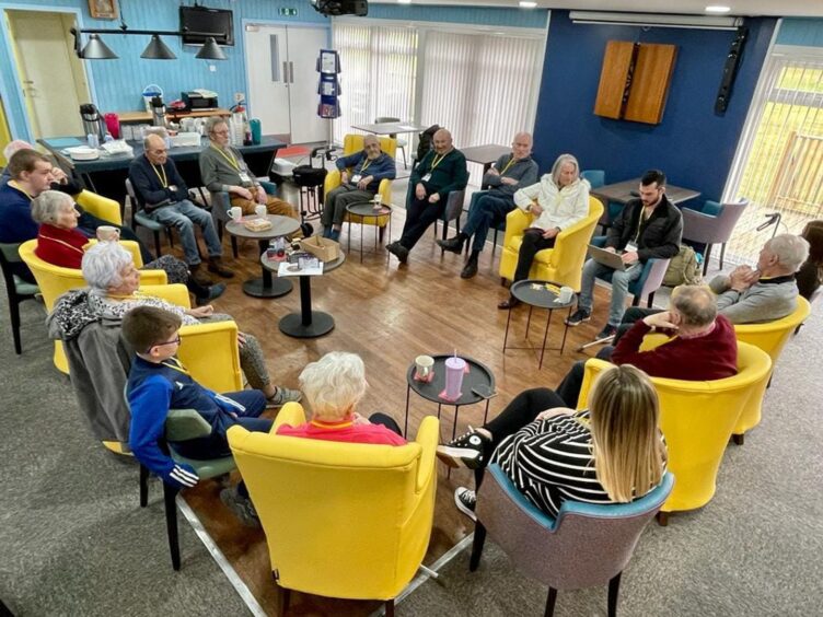 Lochside Connections members working with musician David Falconer during the making of Upon Broad Shoulders. Image: Supplied