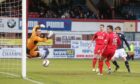 Craig Wighton scores his history-making goal against Raith in 2013. Image: David Young.
