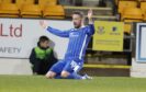 Nicky Clark celebrates his second goal.