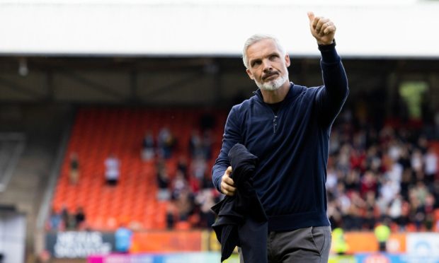 Jim Goodwin salutes Dundee United supporters at Tannadice