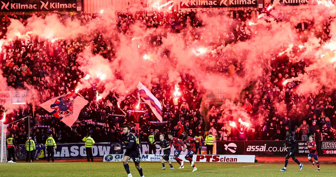 Rangers fans light up the Bob Shankly stand with pyro during a cinch Premiership match between Dundee FC and Rangers at The Scot Foam Stadium at Dens Park, on November 01, 2023, in Dundee, Scotland.