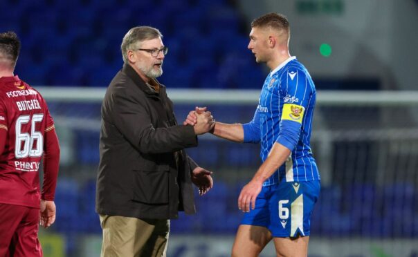 St Johnstone manager Craig Levein and Liam Gordon.