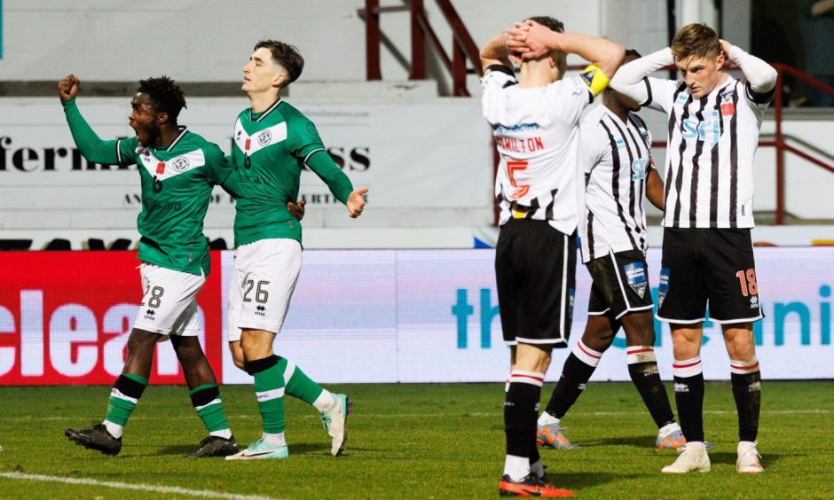 The contrasting emotions writ large as Dundee United's Mathew Cudjoe, left, and Chris Mochrie celebrate and Dunfermline skipper Chris Hamilton is left dejected