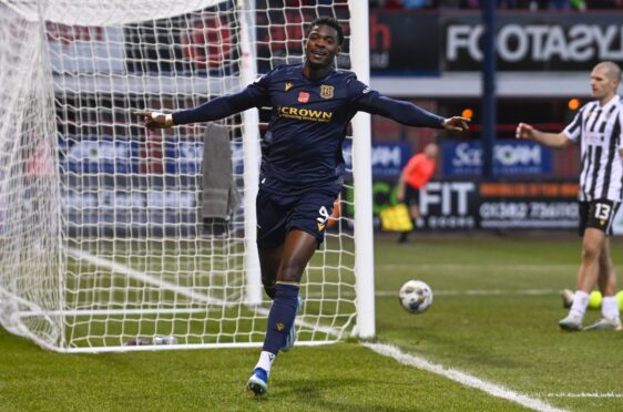 Dundee's Amadou Bakayoko celebrates the second of his brace against St Mirren. Image: SNS