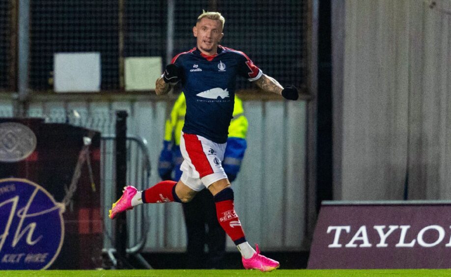 Callumn Morrison of Falkirk celebrates scoring against Dundee United 