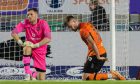 Dejected United stars following Falkirk's fourth goal