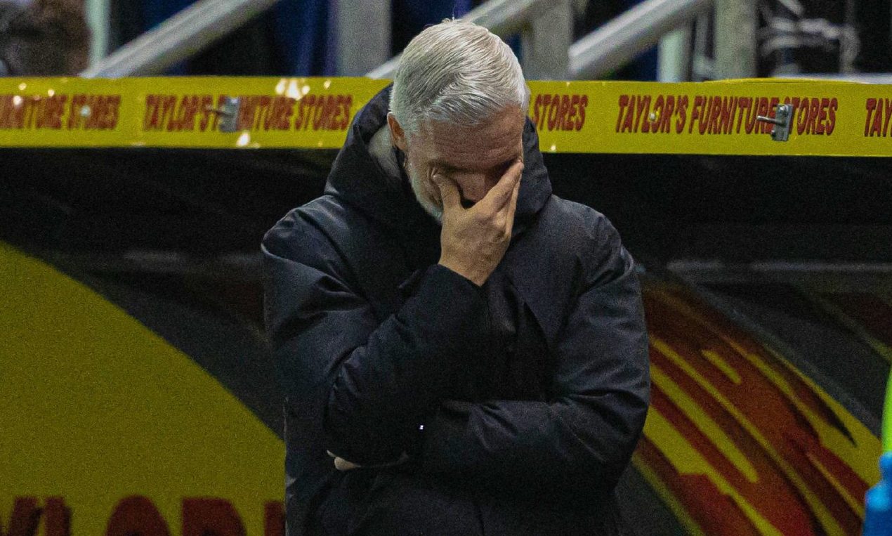 A dejected Jim Goodwin looks on as Dundee United lose at Falkirk