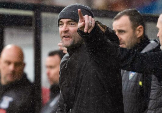 Dunfermline Athletic manager James McPake shouts instructions from the dugout during a match earlier in the season. Image: SNS.