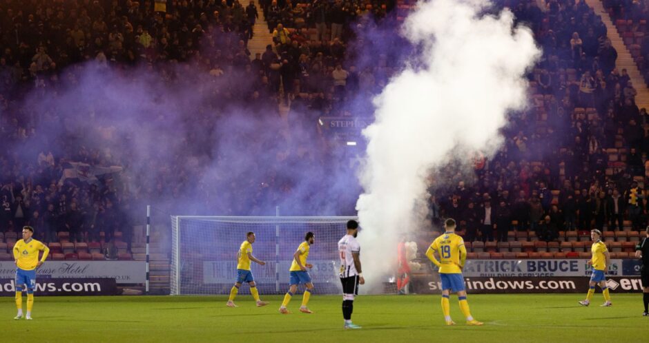 Smoke billows around East End Park in Dunfermline prior to a Fife derby earlier in the season.
