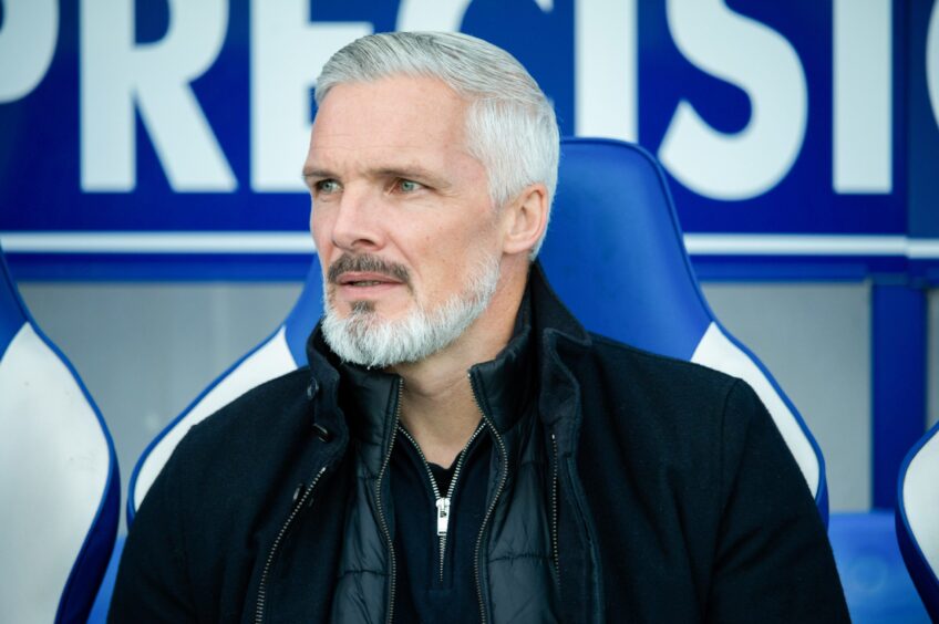 Dundee United boss Jim Goodwin on the touchline at Queen of the South