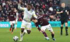 Dan Phillips battles for the ball.