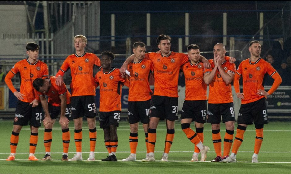 Dundee United players watch on as they crash out of the Scottish Cup