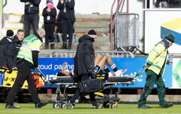 Dunfermline's Kane Ritchie-Hosler goes off injured against Arbroath. Image: SNS