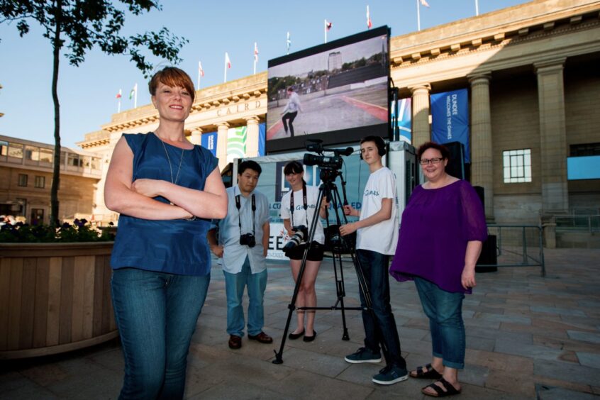 A big screen showing local film makers work and music videos. Pictured, left to right is event organiser Gillian Easson alongside a group of film makers called Oor Games Film Crew from Nilupul Foundation. Left to right is Lawrence Ho, Shauney Watson, Mitchell Watson and Julie Wardrop. 