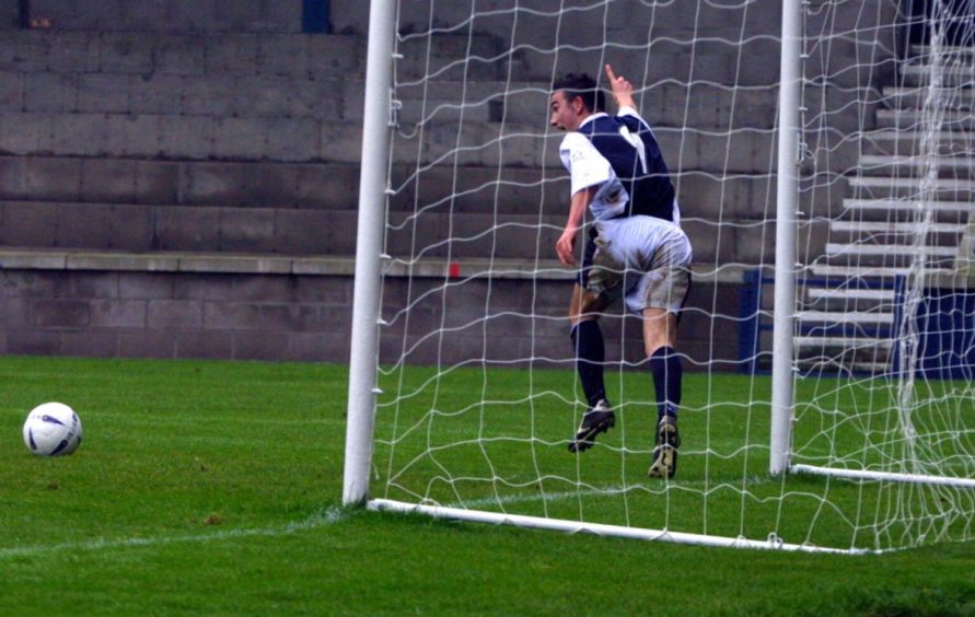 John Martin on the pitch celebrating a goal for Raith Rovers