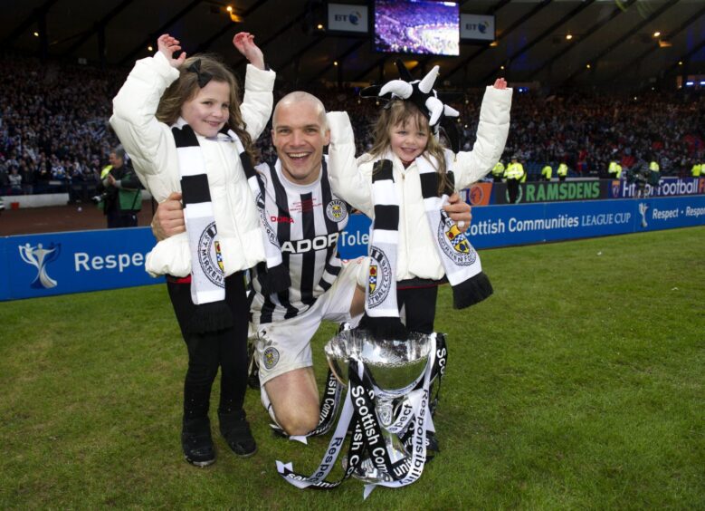 Former St Mirren captain Goodwin with the League Cup trophy and daughters, Ava and Millie