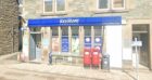 Aberfeldy Premier convenience store with post office sign and post boxes outside.