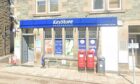 Aberfeldy Premier convenience store with post office sign and post boxes outside.