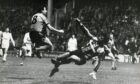 Ralph Milne scores his brilliant second goal at Tannadice. Image: DC Thomson.