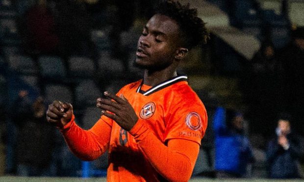 Mathew Cudjoe of Dundee United reacts after missing a penalty against Queen of the South