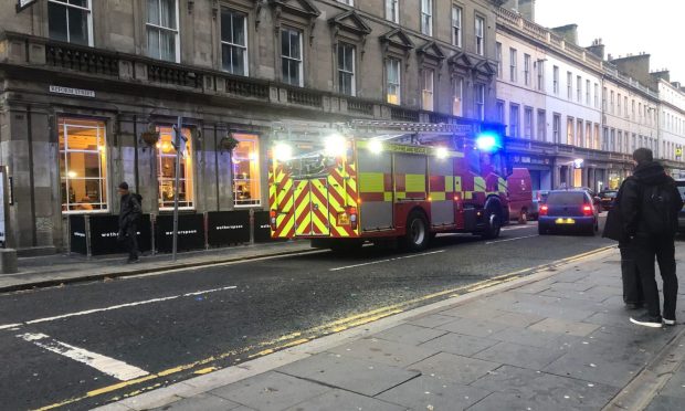 Firefighters on Reform Street, Dundee. Image: James Simpson/DC Thomson