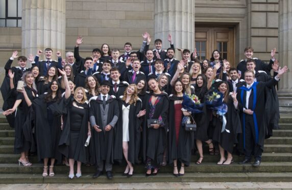 Dental students celebrate after graduating. These dental graduates did a special degree called a BMSC after having their course extended by a year due to Covid. Image: Alan Richardson