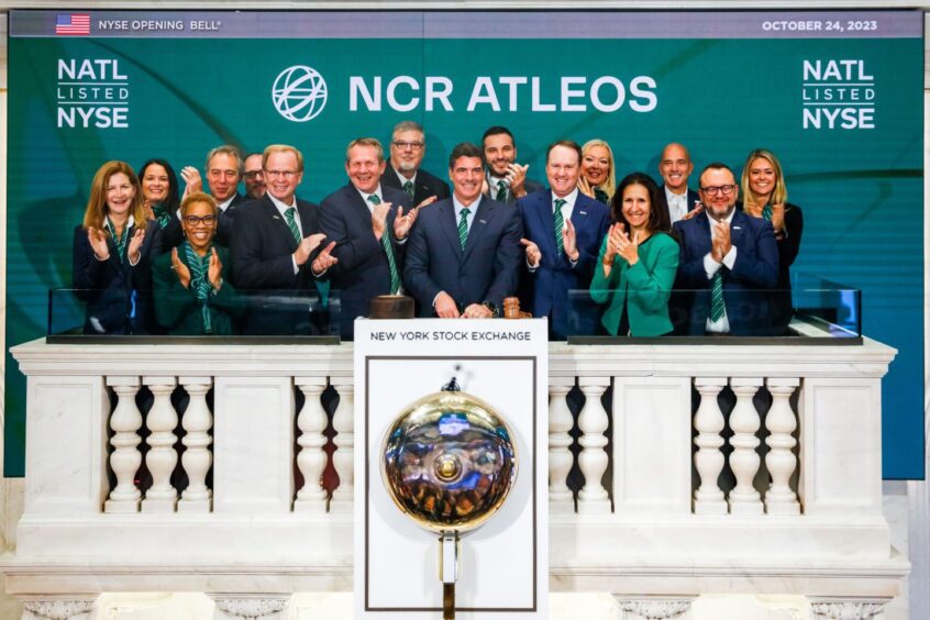 NCR Atleos Dundee site lead Denise Leadingham, second from left, ringing the bell at the New York Stock Exchange.