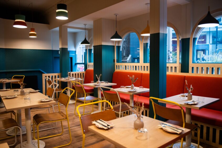 The tables and chairs set up inside the new 71 brewing restaurant, The Maker, Dundee.