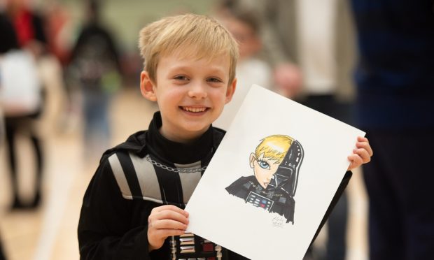 Dundee Comic Con Logan showing off his Manga style portrait. Image: Kim Cessford/DC Thomson