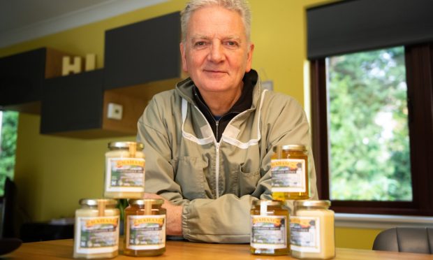 3rd generation honey-maker and beekeeper, John Graham works out of his home to make jars of honey and sells them to the local area. Image: Kim Cessford/DC Thomson