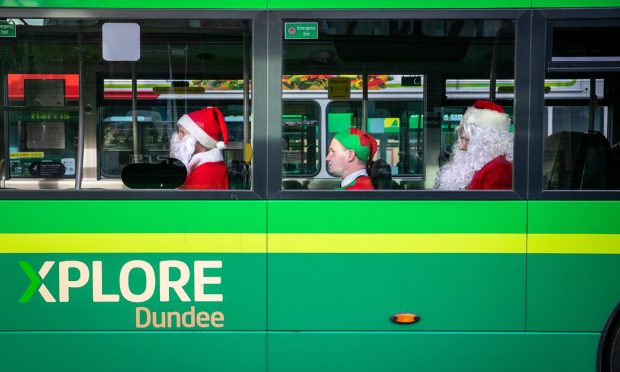 Passengers on an Xplore Dundee bus. The firm has released its Christmas timetable.