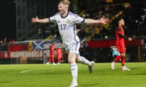 Dundee's Lyall Cameron celebrates after putting Scotland under-21s 2-0 up in Belgium.