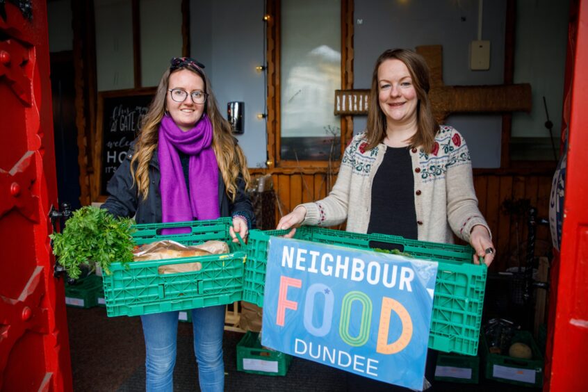 Taylor Flynn and Lynsey Penny holding Neighbourfood Dundee boxes.