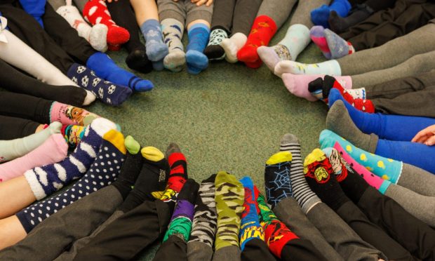 Courier- Cheryl Peebles - Odd Socks Day - CR0039465 - Kirkcaldy - Image shows: Odd Socks Day - start of anti-bullying week Picture shows the children at St Marie's Primary School showing off their odd socks.
14/11/2022 - Image: Kenny Smith/ DC Thomson