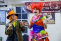 Colourfully dressed characters in dress rehearsals for Perth Drama Club pantomime