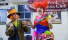 Colourfully dressed characters in dress rehearsals for Perth Drama Club pantomime