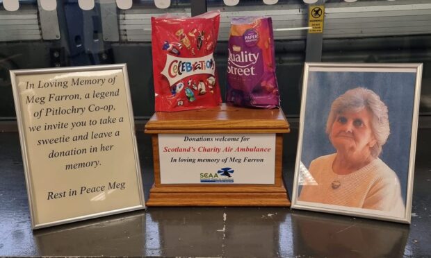The memorial box placed in Pitlochry Co-op for donations to Scotland's Charity Air Ambulance, which Meg Farron supported. Image: W&K Gerrie funeral directors.