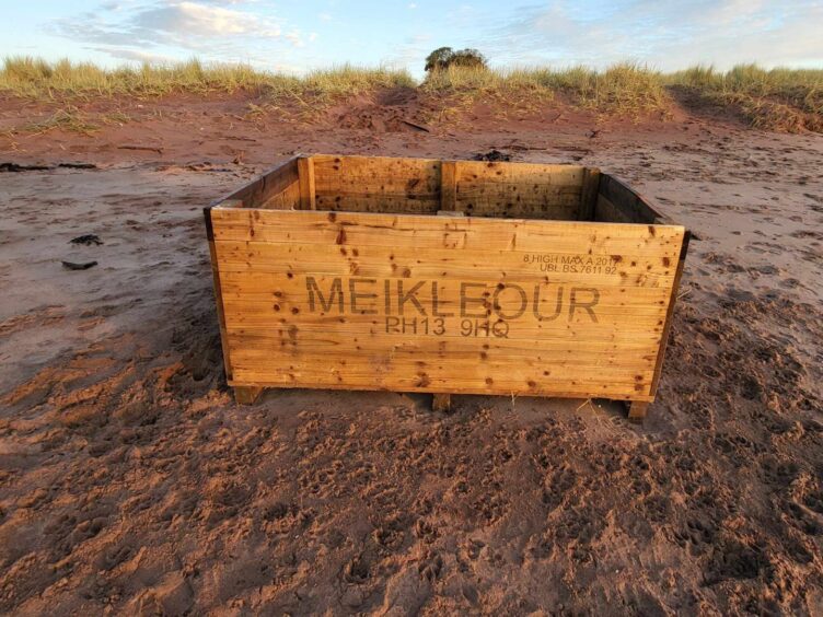Potato crate, with Meikleour written on side, on Monifieth beach