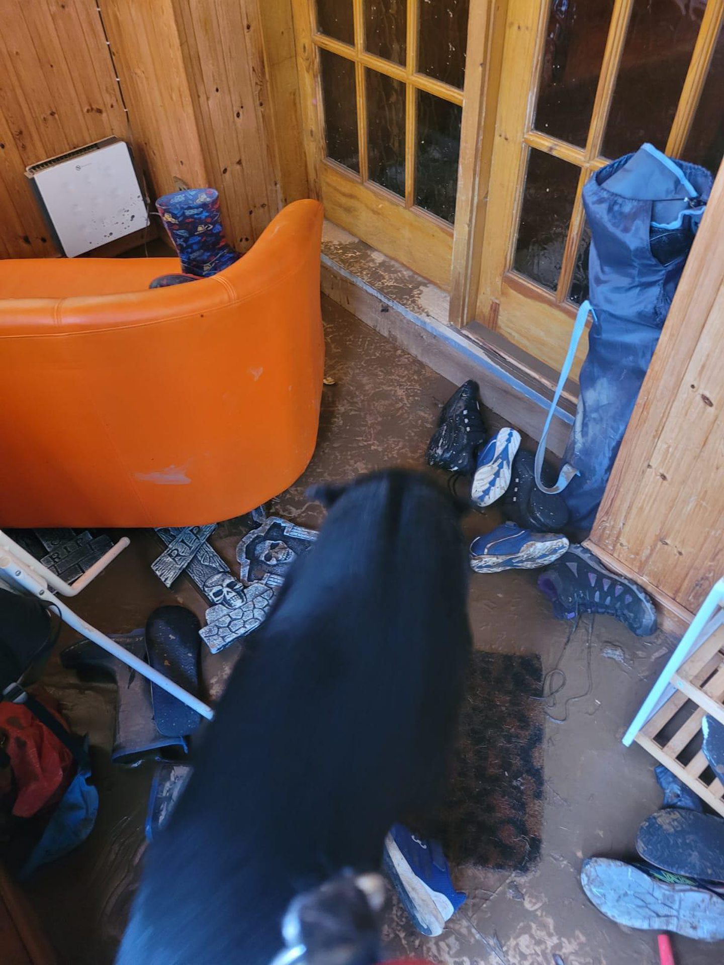 Flood damage inside Laura's home