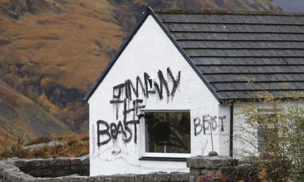 The vandalised Glencoe house that was owned by sexual predator Jimmy Savile. Image: PA/DC Thomson
