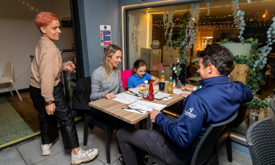 Jamie and family enjoy a meal at the Tailend on Market Street, St Andrews. 