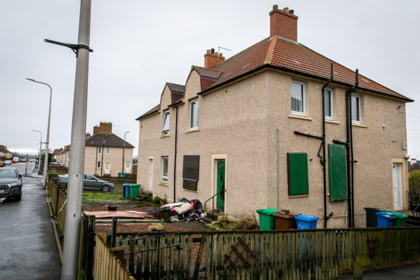 Ean Coutts boarded up home in Kinglassie