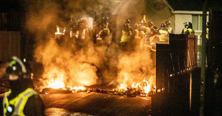 Riot police in Kirkton on Halloween night 2023.