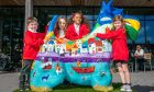 It's 10 weeks since Tayport Primary pupils Sebastian, Penelope, Sadie and Freya welcomed the town's Scottie to the Larick Centre. Image: Steve Brown/DC Thomson