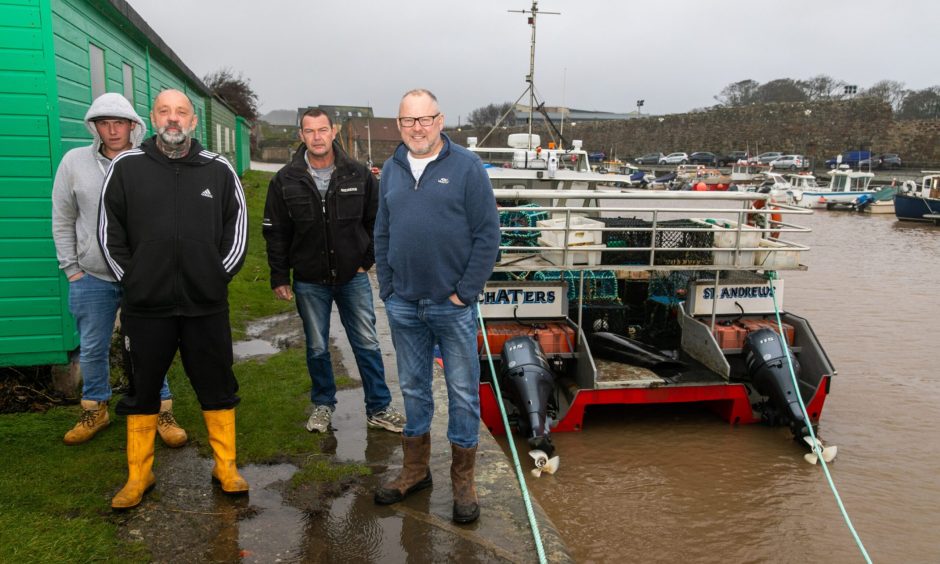 John and Gordon at St Andrews Harbour with crew members Lee Gardener, left, and Colin Brown. Image: Steve Brown/DC Thomson